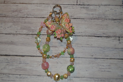 Coral Floral Butterfly Phone Wristlet