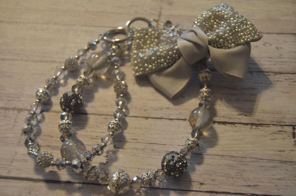Silver Bow Phone Wristlet