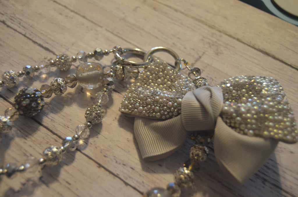 Silver Bow Phone Wristlet